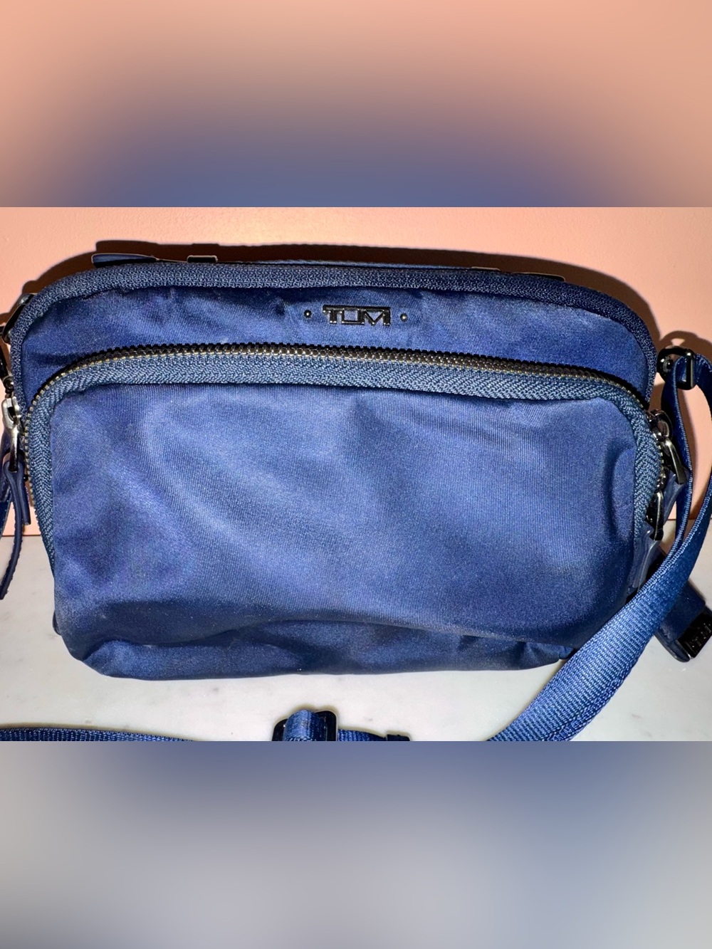 Tumi Midnight Blue Crossbody Voyageur Travel Bag with Leather Handle Detail